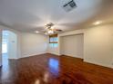 Bright living room showcasing hardwood floors and ample space for entertaining at 1995 Sundown Canyon Dr, Henderson, NV 89014
