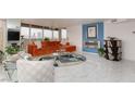 Stylish living room featuring city views, modern fireplace, and unique decor at 3111 Bel Air Dr # 12G, Las Vegas, NV 89109