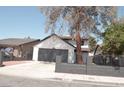 Charming two-story home with a well-maintained yard and a spacious driveway at 1805 Amboy Dr, Las Vegas, NV 89108