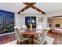 Charming dining room featuring hardwood floors, exposed beam ceiling, and views of the city at 2777 Paradise Rd # 2001, Las Vegas, NV 89109