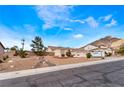 Charming single-story home featuring a well-manicured yard and a three-car garage at 7076 Oakleigh Dr, Las Vegas, NV 89110