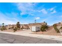 Charming single-story home featuring a well-manicured yard and a three-car garage at 7076 Oakleigh Dr, Las Vegas, NV 89110