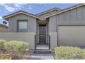 Charming single story home featuring a lovely landscaped front yard and gated entrance at 2395 Arrington Ave, North Las Vegas, NV 89086
