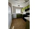 Functional kitchen with appliances, ample counter space and lots of storage at 3710 Royal Fern Cir, Las Vegas, NV 89115