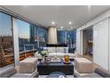 Beautifully decorated living room with floor-to-ceiling windows and city views at 3726 Las Vegas Blvd # 606, Las Vegas, NV 89158