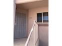 Front entryway featuring security door, stairway, and window at 4555 E Sahara Ave # 226, Las Vegas, NV 89104