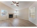 Bright living room features a fireplace, ceiling fan, and natural light at 5725 Cedar Ave, Las Vegas, NV 89110