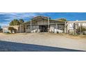 Large horse barn with multiple stalls, providing ample space for equestrian activities at 6325 Guy Ave Ave, Las Vegas, NV 89131