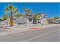 Charming two-story home with a well-manicured yard and professional landscaping at 652 Del Prado Dr, Boulder City, NV 89005