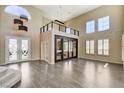 Spacious room with tall ceilings and large windows, perfect for gathering and entertaining at 8113 Gothic Ave, Las Vegas, NV 89117