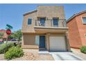 Two-story home with a one-car garage and private balcony at 9431 Mad Dog St, Las Vegas, NV 89178