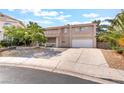 Charming two-story home featuring a well-maintained front yard and a spacious driveway at 2874 Avanti Ln, Henderson, NV 89074