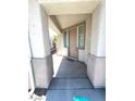 Covered front entrance leading to the front door at 3261 Monaco Shores Dr, Las Vegas, NV 89117
