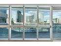 A close up of the spectacular city views from the unit's balcony with floor to ceiling windows at 4471 Dean Martin Dr # 1109, Las Vegas, NV 89103
