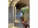 Covered front porch entrance leads to a well-maintained, landscaped yard at 5353 Hollow Brook Ave, Las Vegas, NV 89142