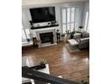 Top-down view of a well-appointed living room with fireplace and stylish decor at 682 Corte Madera Ave, Henderson, NV 89015