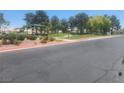 Scenic community park view featuring lush trees, green spaces, and relaxing gazebo at 7657 Velvet Mist St, Las Vegas, NV 89131