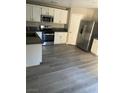 Well-equipped kitchen with stainless steel appliances and ample counter space at 7977 Delft Blue St, Las Vegas, NV 89139