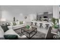Open-concept living area showcasing the living room and kitchen, creating an ideal space for entertaining at 871 Apatite Pl # Lot 54, Henderson, NV 89011