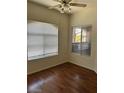 Bedroom with wood laminate flooring and windows, natural lighting, and neutral walls at 9000 Las Vegas Blvd # 2189, Las Vegas, NV 89123