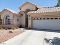 Charming home with a two-car garage, desert landscaping, and a stucco exterior at 110 Eagleview Ct, Henderson, NV 89074