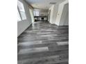 Spacious living room featuring modern flooring and plenty of natural light at 11173 Hickory Glen St, Las Vegas, NV 89179