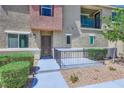 Charming townhome entrance featuring a private patio and well-kept landscaping for a welcoming appeal at 12282 Azure Gate Rd # 4, Las Vegas, NV 89183