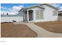 Inviting home featuring well-maintained landscaping at 1290 Dalene Ave, Henderson, NV 89002