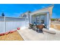 Inviting front porch with cozy seating, perfect for relaxing outdoors at 1290 Dalene Ave, Henderson, NV 89002