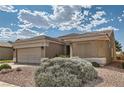 Desert landscaped single-story home featuring stone and mature bushes at 1816 Eagle Mesa Ave, Henderson, NV 89012