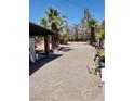 Expansive backyard featuring mature trees and plenty of room for storage at 2645 Lindell Rd, Las Vegas, NV 89146