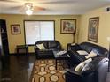 Cozy living room filled with natural light, featuring comfortable seating and stylish decor at 3167 El Cedro Cir, Las Vegas, NV 89121