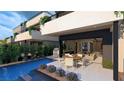 Private backyard with a pool, patio, and dining area for outdoor entertaining at 4086 Heron Fairway, Las Vegas, NV 89141