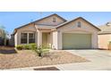 Charming single-story home featuring a two-car garage, low maintenance desert landscaping and neutral color palette at 5112 Foggia Ave, Las Vegas, NV 89130