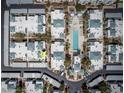Bird's-eye view of the condo community, highlighting its layout and amenities like a pool at 7100 Pirates Cove Rd # 1099, Las Vegas, NV 89145