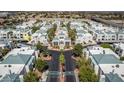 Aerial view of a gated community, showcasing the building architecture and lush landscaping at 7100 Pirates Cove Rd # 1099, Las Vegas, NV 89145