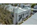 A modern apartment building with multi-level balconies, exterior stairs and landscaped grounds at 7100 Pirates Cove Rd # 1099, Las Vegas, NV 89145