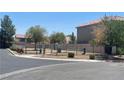 Community dog park with fencing, benches, and waste disposal station at 728 Brown Breeches Ave, North Las Vegas, NV 89081