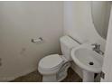 Cozy half-bathroom with a pedestal sink and standard fixtures at 8865 Knickknack Ct, Las Vegas, NV 89149
