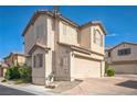 Well-maintained two-story home featuring a two-car garage at 9053 Starling Wing Pl, Las Vegas, NV 89143