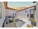 Stylish outdoor patio with plush seating, ideal for enjoying peaceful moments and outdoor gatherings at 10814 Franklin Hills Ave, Las Vegas, NV 89135