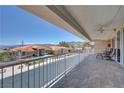 Spacious balcony with tile flooring and outdoor seating, offering panoramic views at 144 Desert Valley Dr, Boulder City, NV 89005