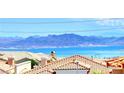 Beautiful Lake Mead and mountain views from atop the terracotta roofs of this stunning neighborhood at 144 Desert Valley Dr, Boulder City, NV 89005
