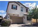 Charming two-story home featuring a neutral stucco facade, brick driveway, and well-maintained landscaping at 147 Augusta Course Ave, Las Vegas, NV 89148