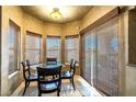 Breakfast nook with bright light and matching table and chairs at 4545 W Agate Ave, Las Vegas, NV 89139