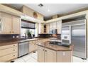 Updated kitchen featuring stainless steel appliances and granite countertops at 4545 W Agate Ave, Las Vegas, NV 89139