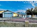 Charming single-story home with an attached two-car garage and a well-maintained front yard at 5368 Regal Ave, Las Vegas, NV 89146