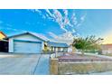 Charming single-story home with an attached two-car garage and a well-maintained front yard at 5368 Regal Ave, Las Vegas, NV 89146