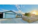 Charming single-story home with an attached two-car garage and a well-maintained front yard at 5368 Regal Ave, Las Vegas, NV 89146