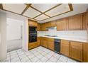 Functional kitchen with appliances and ample counter space, ideal for cooking and meal preparation at 615 Cervantes Dr, Henderson, NV 89014